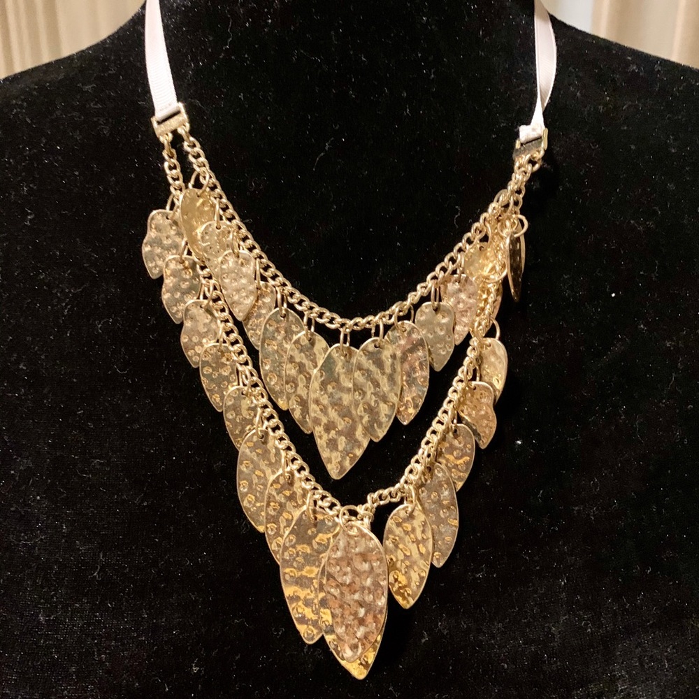 Gold statement necklace with ribbon tie
